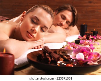 Couple lying on the massage desks on the spa salon. Beauty treatment concept.