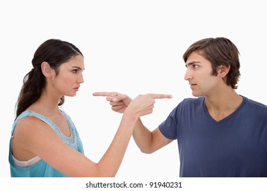 Couple Mad At Each Other Against A White Background