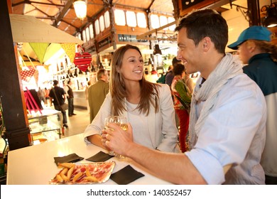 Couple In Madrid Eating Spanish Savouries