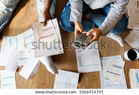 Couple managing the debt