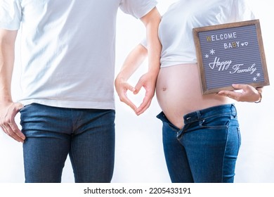 A couple maternity photo image that made a heart in casual clothes White background (shooting a real pregnant woman) - Shutterstock ID 2205433191