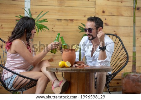 Similar – Young women couple drinking healthy drinks outdoors