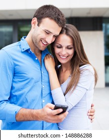 Couple With Mobile Phone