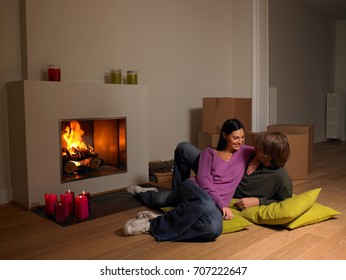 Couple With Moving Boxes, Fire Place