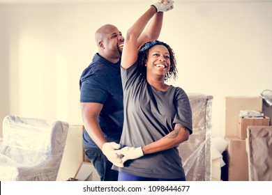 Couple Moving Into New House