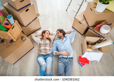 Couple Moving To A New Home - Happy Married People Buy A New Apartment To Start New Life Together