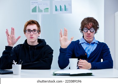 A Couple Of Nerd Office Workers Showing A Very Popular Science Fiction Salutation