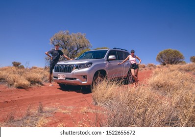 Couple At Off-road Car In The Australian Desert - Alice Springs Outback Australia 1.10.2019