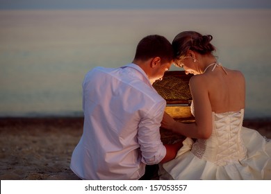 The Couple On The Beach At Night