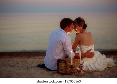 The Couple On The Beach At Night