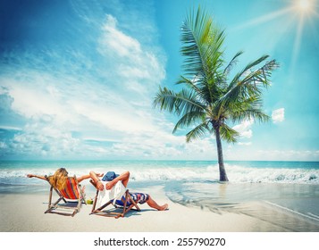 Couple On The Beach At Tropical Resort Travel Concept