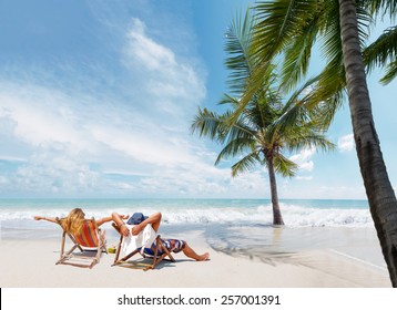 Couple On The Beach At Tropical Resort Travel Concept