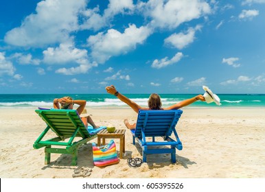 Couple On The Beach At Tropical Resort Travel Concept