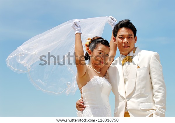 Couple On Beach Wedding Dress Bride Stock Photo Edit Now