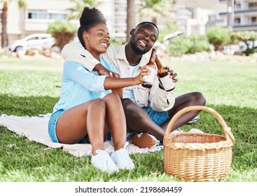 Couple on garden picnic date, black woman and drink bottle of beer together. Young african man, drinking alcohol and happy girl. Outdoor nature, park in city and love relationship time together - Powered by Shutterstock