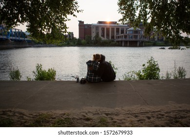 Couple On The Grand River In Grand Rapids, Michigan