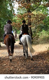 A Couple On A Horse Ride.