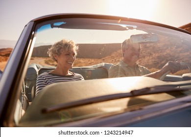 Couple On Road Trip, Seen Through Car Windscreen, Close Up