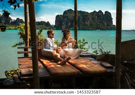 Couple on their honeymoon. Couple travels the world. Happy couple on vacation. Man and woman traveling to Thailand. Holidays on beautiful Islands. Tourists on vacation. Trip to the islands  