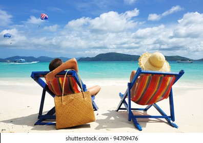 Couple on a tropical beach - Powered by Shutterstock