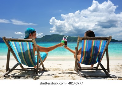 10,152 Woman on beach lounge chair Stock Photos, Images & Photography ...