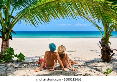 Couple On A Tropical Beach At Tioman Island, Malaysia