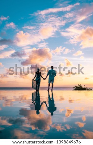 couple on vacation at the tropical Island Saint Lucia Caribbean, St Lucia couple watching Pitons mountains