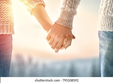 Couple on Valentines day. Woman and man holding hands. - Powered by Shutterstock