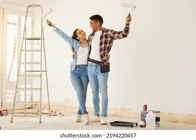 Couple Painting Room For Interior House Renovation And Home Or Property Design Project With Smile, White Wall Background Mockup. New Home Or Apartment And Happy Painter People With DIY Hardware