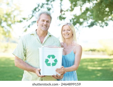 Couple, park and recycling bin for nature, cleanup or eco friendly growth for clean earth. People, portrait and smile for sustainability, ecology or responsible trash removal for hope or conservation - Powered by Shutterstock