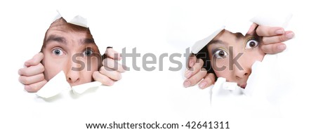 couple peeping through hole in white paper