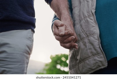 Couple, people and holding hands in outdoor for walk, together and support in London. Relationship, date and bonding for romance with sunset for care, relax and happiness as soulmate for love - Powered by Shutterstock