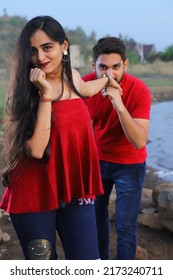 Couple Photo Shoot In Red Clothes At Outdoor