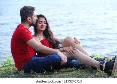 Couple Photo Shoot In Red Clothes At Outdoor