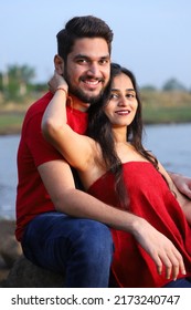 Couple Photo Shoot In Red Clothes At Outdoor