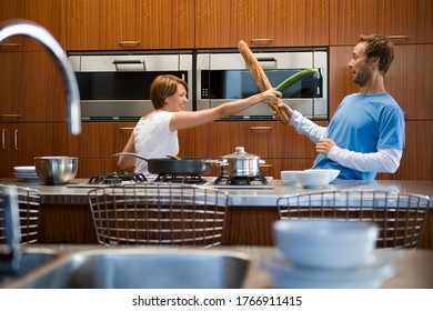 Couple Play Fighting With Food