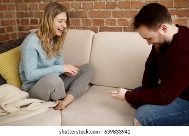 Couple Playing With Cards.