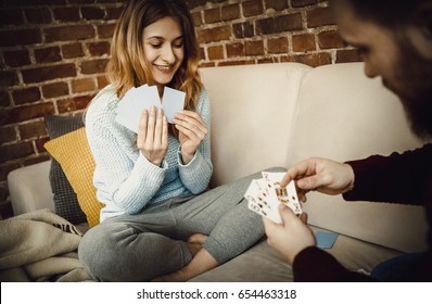 Couple Playing With Cards.