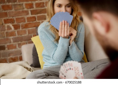 Couple Playing With Cards.