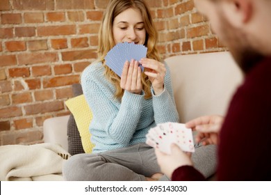 Couple Playing With Cards.