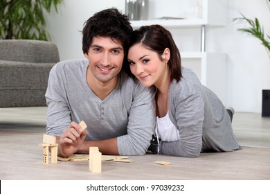 Couple Playing Dominoes