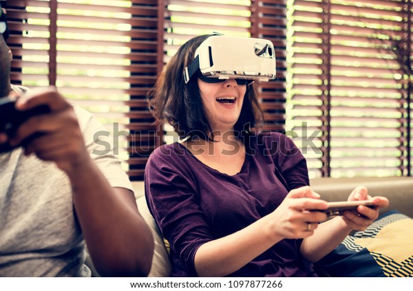 Couple playing VR video
game