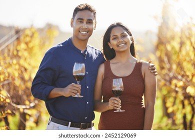 Couple, portrait and happy at vineyard with glass for wine tasting, hug and vacation in countryside. Man, woman and smile with drink, alcohol and date at farm in summer for holiday in California - Powered by Shutterstock