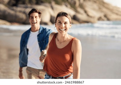 Couple, portrait and holding hands with woman at beach on journey in summer, holiday or vacation. Happy, travel and lead man with smile on face on island at sunset offshore and adventure in marriage - Powered by Shutterstock