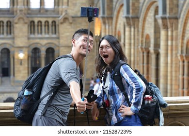 A Couple Post For A Selfie While Visiting The Natural History Museum On June 16, 2015 In London, UK. The World Famous Museum Was Established In 1881 And Houses 80 Million Items From Around The World.