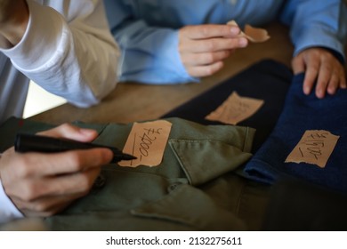 A Couple Preparing To Sell At A Flea Market 