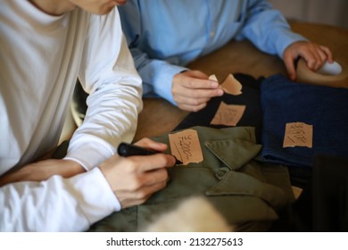 A Couple Preparing To Sell At A Flea Market 