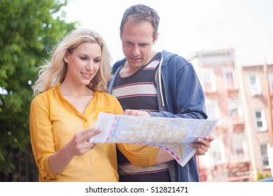 Couple reading map
