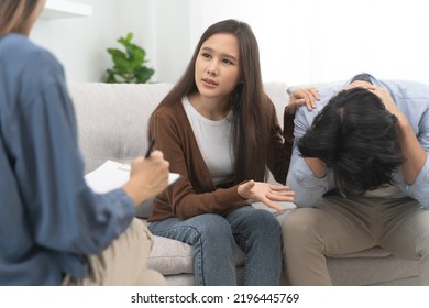 couple relationship therapy with a counselor. Close Up hands of the woman client during a conversation with psychologist to find problems and solution. - Powered by Shutterstock