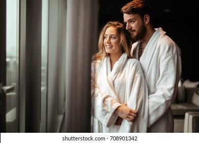 Couple Relaxing In Bathrobe